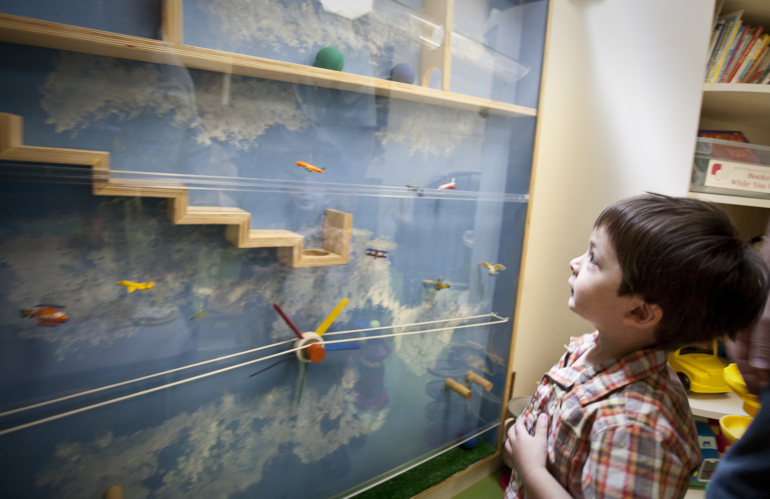 Boy looking at interactive wall